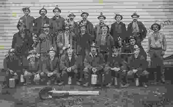 A Group Of Miners And Lace Workers Pose For A Photograph. The Weight Of Coal And Lace