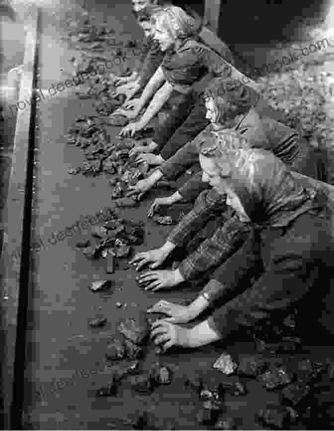 A Group Of Women Coal Miners Pose For A Photograph. The Weight Of Coal And Lace